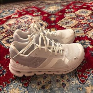 On Running White and Light Gray Athletic Shoes